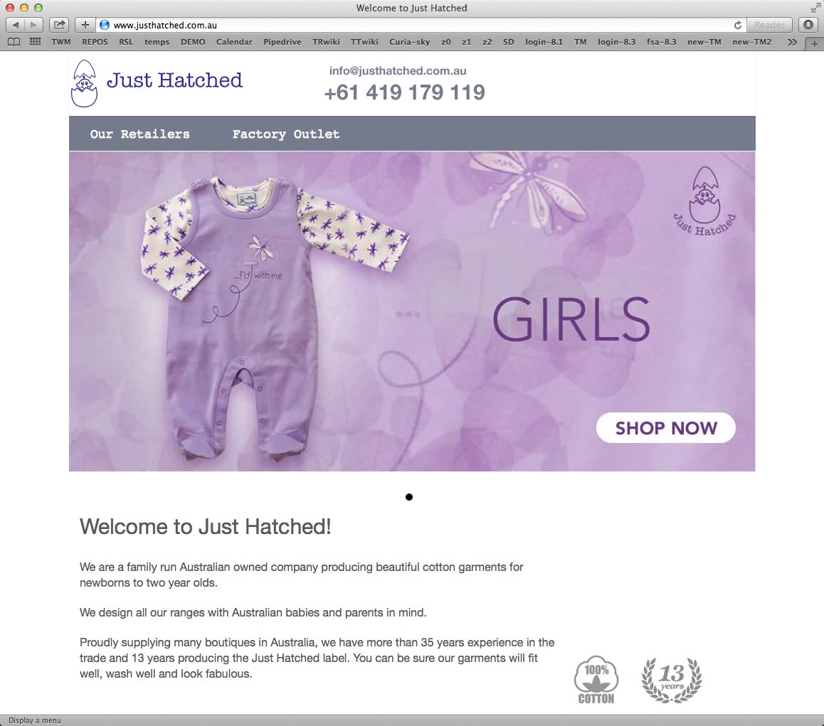 Just Hatched online baby clothing store homepage showing girls clothing and shop navigation.